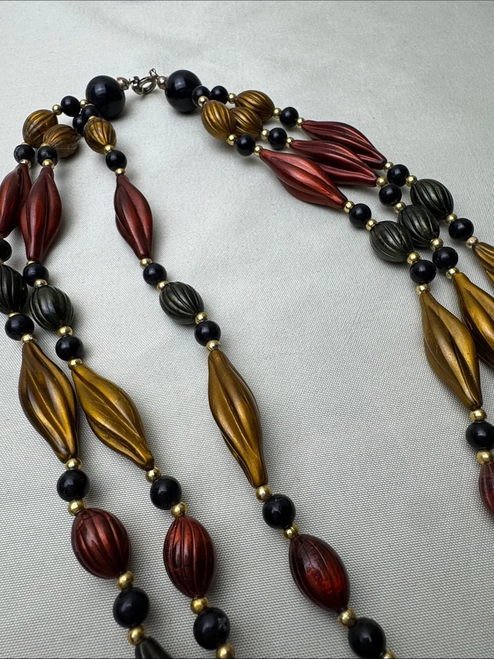 Multi-Strand Metallic Bead Necklace in Red, Gold & Black - Picture 5 of 10